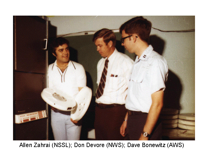 Allen Zahrai, Don Devore and Dave Bonowitz look at the tapes used to record Doppler data