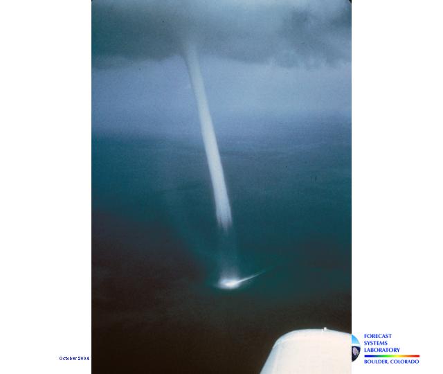 The image shows a well-defined waterspout.