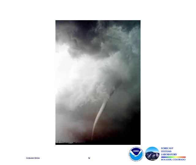 Debris is visible on the ground from this rope-like funnel descending from a wall cloud during the Union City, Oklahoma tornado.