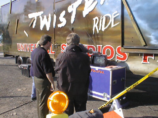 Fans in Detroit watch a video outside the Twister Truck 