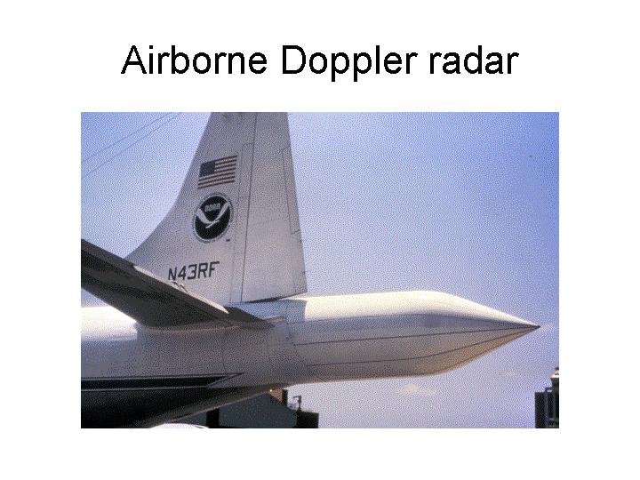 The airborne Doppler radar extends from the tail section of the NOAA P-3 aircraft