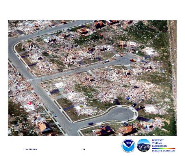 This damage picture shows a completely destroyed residential neighborhood where only the streets, driveways and sidewalks are recognizable.