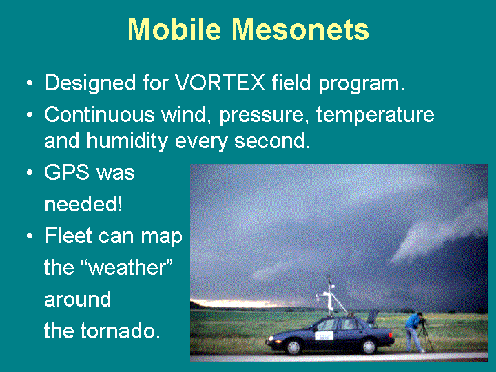 An instrumented vehicle in the field collects atmospheric data continuously while the researcher photographs the storm from outside the vehicle.