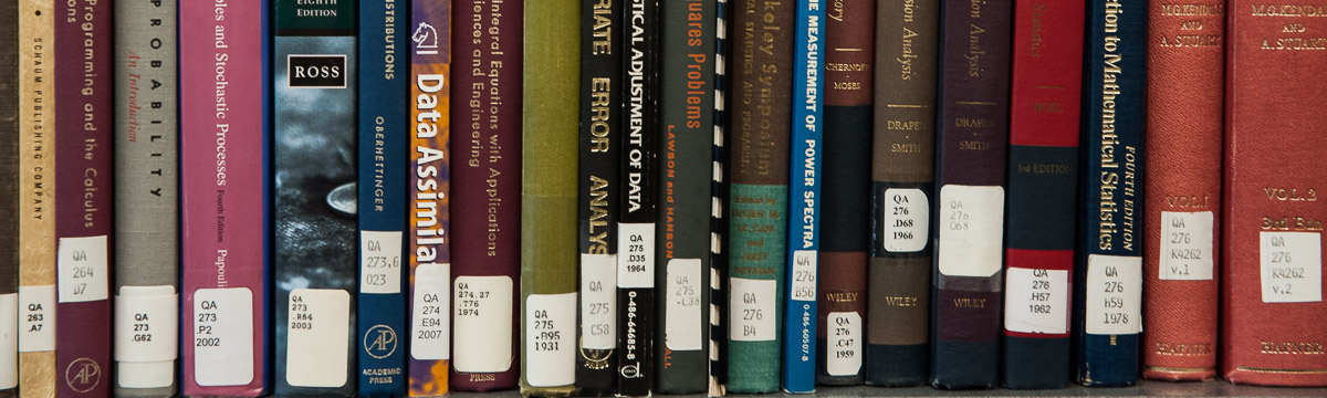 Books in the library at the National Weather Center