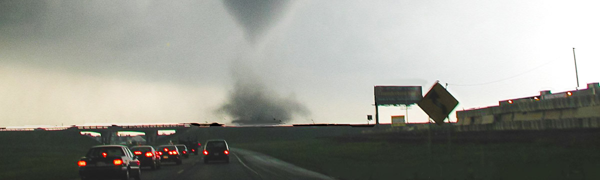 Tornado ahead: cars on freeway