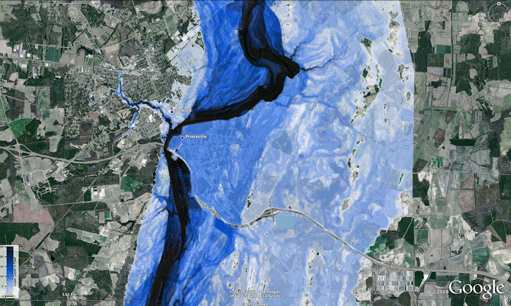 satellite image of the area surrounding a river, showing flood area in blue
