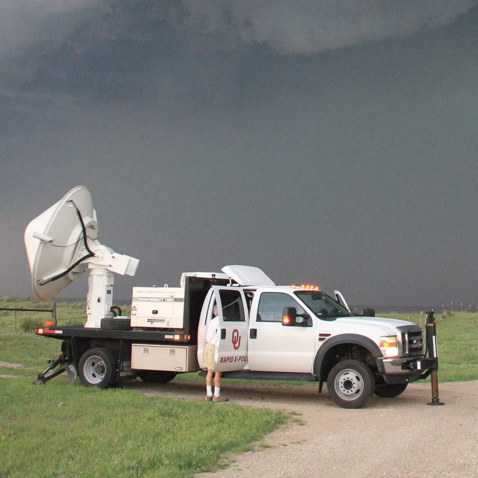 radar mounted on truck, in a hangar