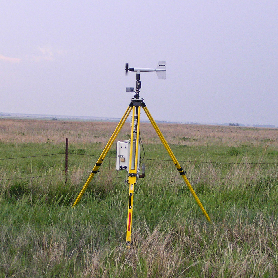 instrumentation on tripod in a pasture