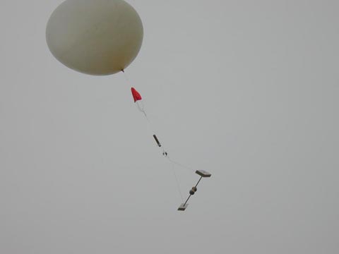 Latex balloon lifing instruments shortly after launch.